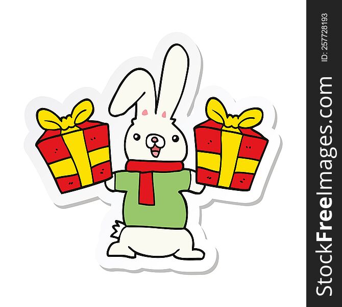 sticker of a cartoon rabbit with christmas presents