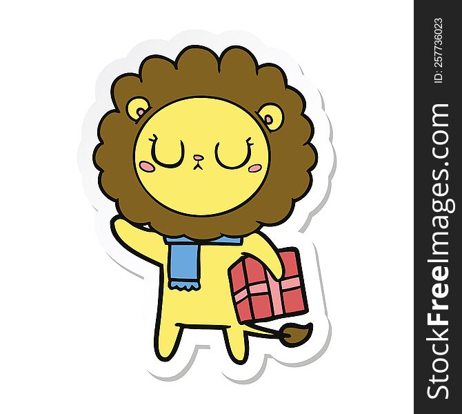 sticker of a cartoon lion with christmas present