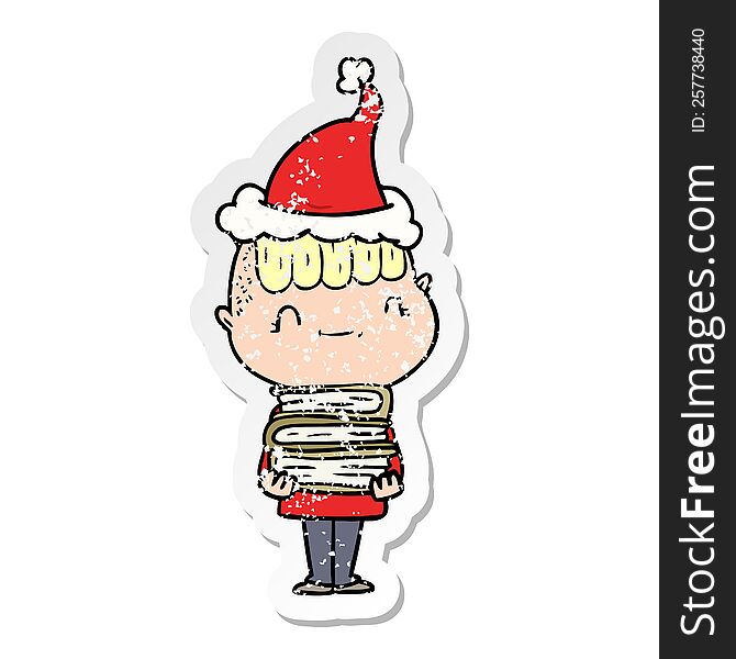 hand drawn distressed sticker cartoon of a friendly boy with books wearing santa hat