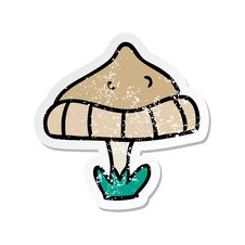 Distressed Sticker Cartoon Doodle Of A Single Mushroom Stock Photo
