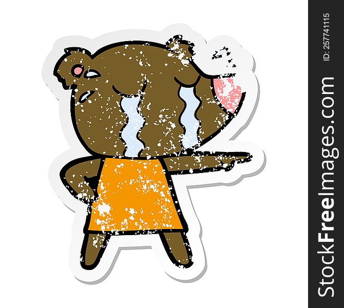 Distressed Sticker Of A Cartoon Crying Bear In Dress Pointing