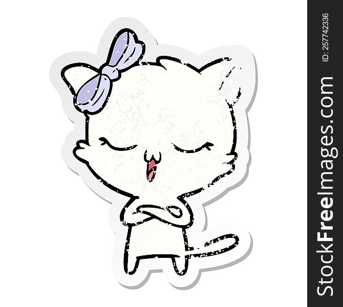 distressed sticker of a cartoon cat with bow on head