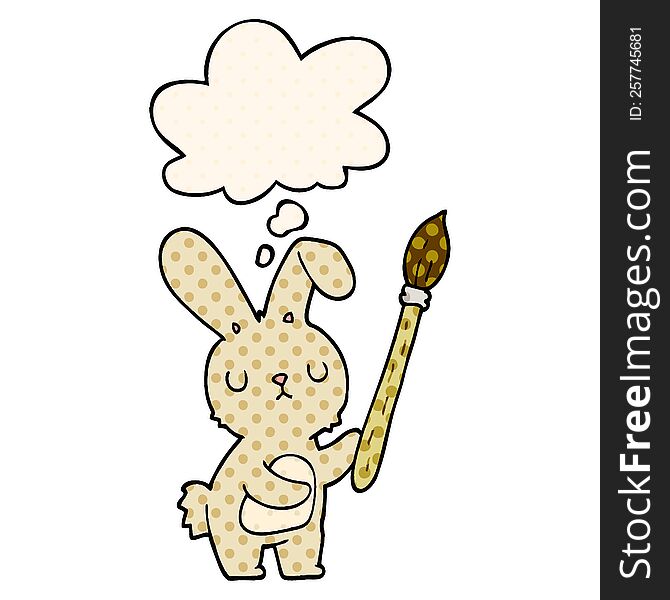 cartoon rabbit with paint brush with thought bubble in comic book style