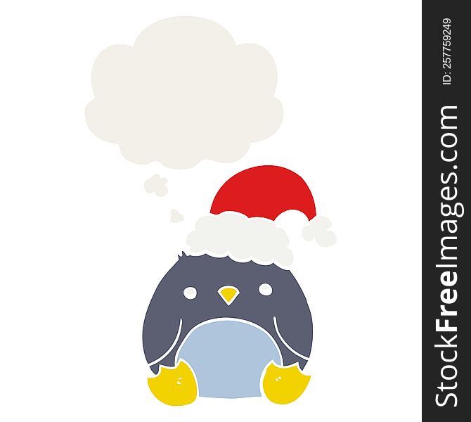 cute cartoon penguin wearing christmas hat with thought bubble in retro style