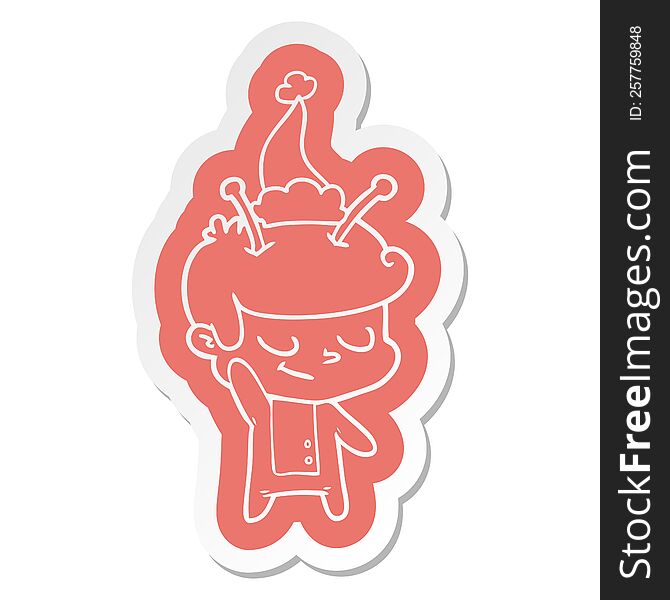 Friendly Cartoon  Sticker Of A Spaceman Wearing Santa Hat
