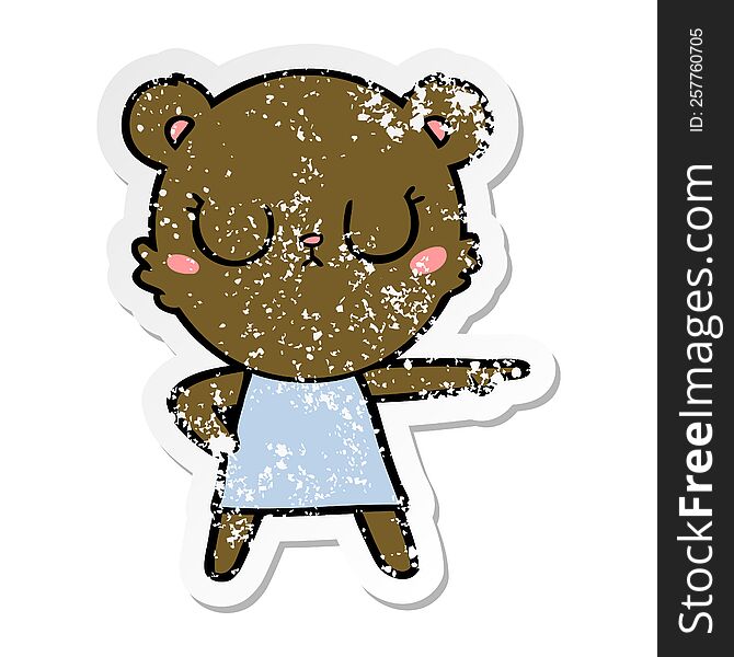 distressed sticker of a peaceful cartoon bear in dress pointing