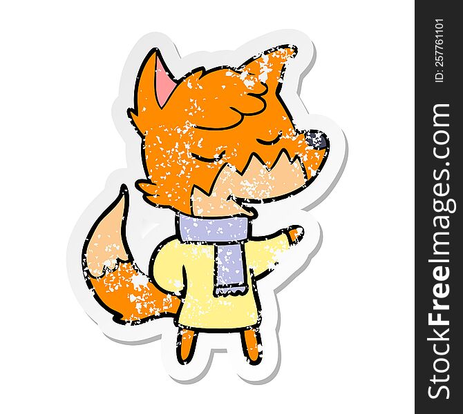 distressed sticker of a friendly cartoon fox in winter clothes