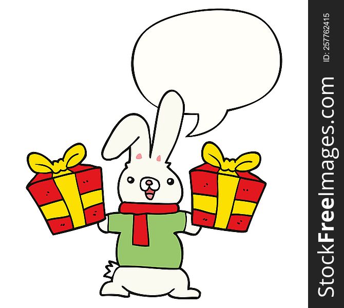 Cartoon Rabbit And Christmas Presents And Speech Bubble