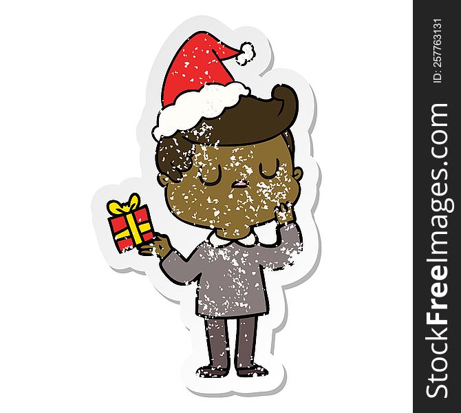 Distressed Sticker Cartoon Of A Man Wondering Wearing Santa Hat