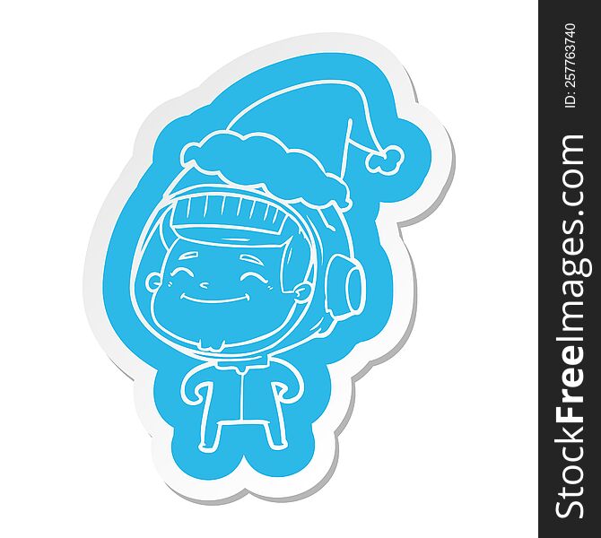 happy quirky cartoon  sticker of a astronaut wearing santa hat