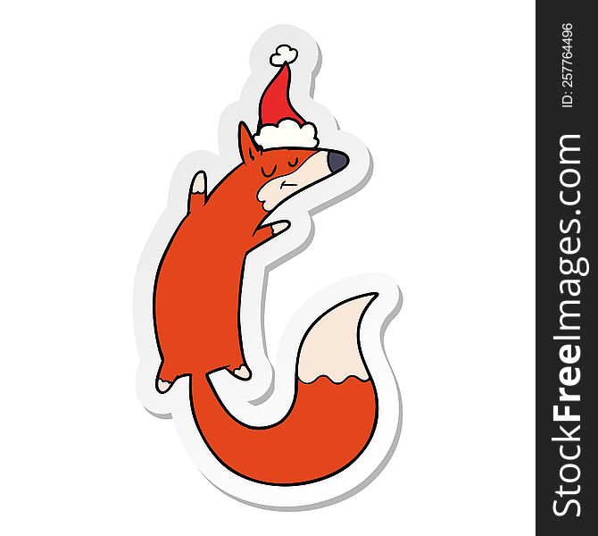 hand drawn sticker cartoon of a jumping fox wearing santa hat