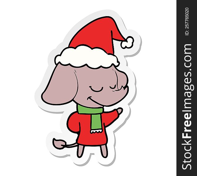 hand drawn sticker cartoon of a smiling elephant wearing scarf wearing santa hat