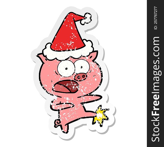 hand drawn distressed sticker cartoon of a pig shouting and kicking wearing santa hat