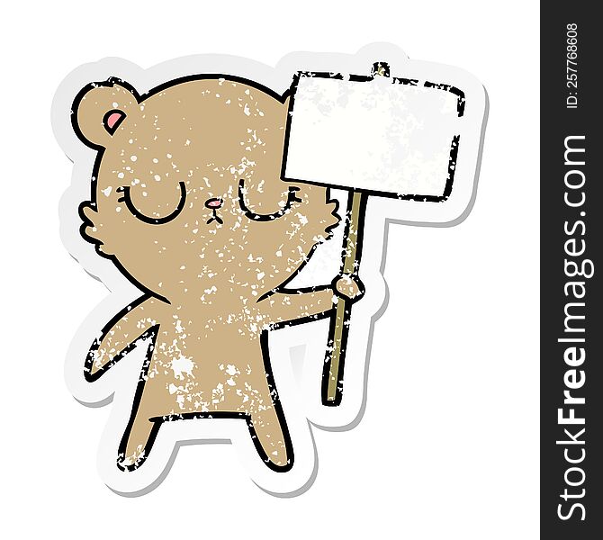 distressed sticker of a peaceful cartoon bear cub with protest sign