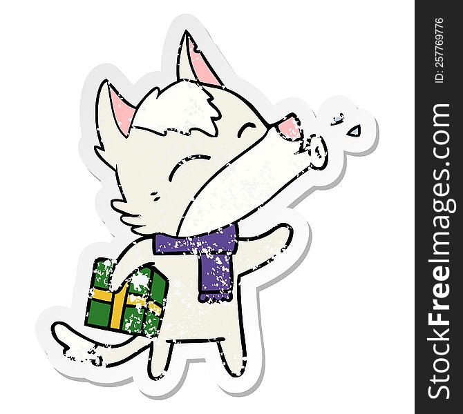 Distressed Sticker Of A Howling Wolf With Christmas Present