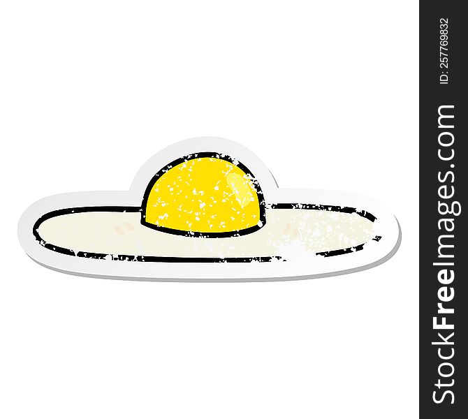 distressed sticker of a quirky hand drawn cartoon fried egg
