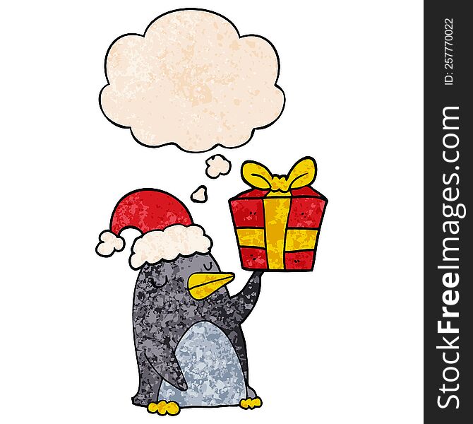 Cartoon Penguin With Christmas Present And Thought Bubble In Grunge Texture Pattern Style