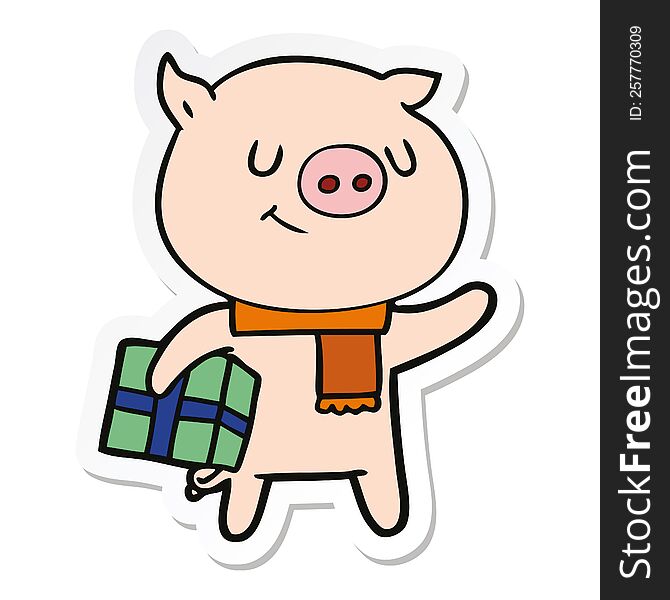 sticker of a happy cartoon pig with christmas present