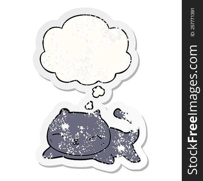 cartoon cat with thought bubble as a distressed worn sticker