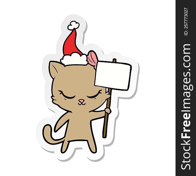 cute hand drawn sticker cartoon of a cat with sign wearing santa hat. cute hand drawn sticker cartoon of a cat with sign wearing santa hat
