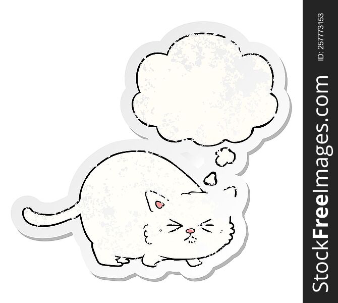 cartoon angry cat with thought bubble as a distressed worn sticker