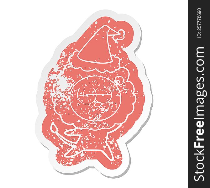quirky cartoon distressed sticker of a bored lion wearing santa hat