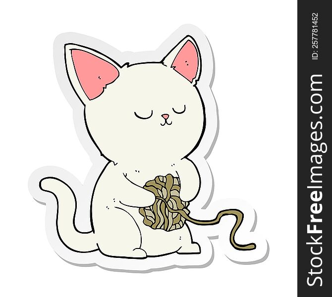 sticker of a cartoon cat playing with ball of yarn