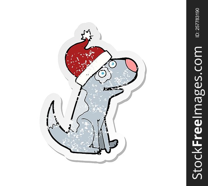 retro distressed sticker of a cartoon dog wearing christmas hat