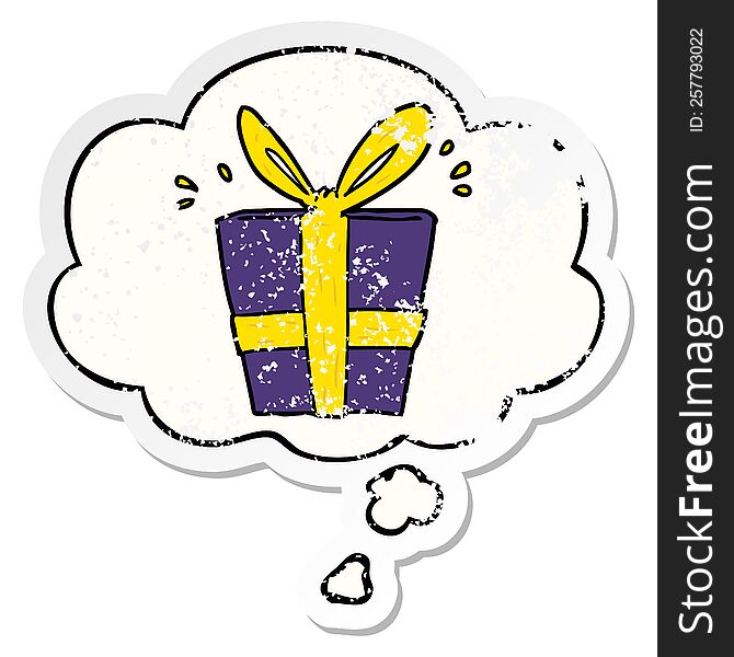 cartoon wrapped gift with thought bubble as a distressed worn sticker