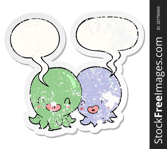 two cartoon octopi  with speech bubble distressed distressed old sticker. two cartoon octopi  with speech bubble distressed distressed old sticker