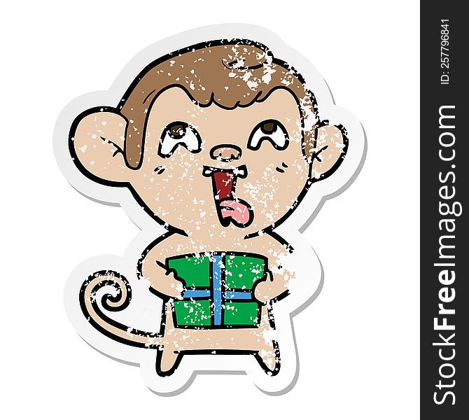 distressed sticker of a crazy cartoon monkey with christmas present