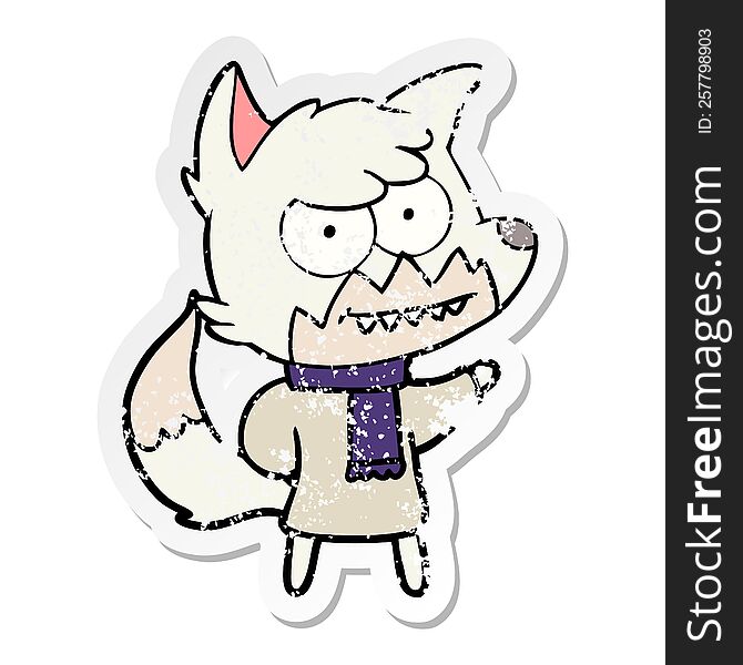 distressed sticker of a cartoon grinning fox in winter clothes