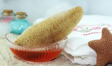 Loofah, Bath Salts And Aromatic Liquid Soap Royalty Free Stock Images Loofah, Bath Salts And Aromatic Liquid Soap Royalty Free Stock Images