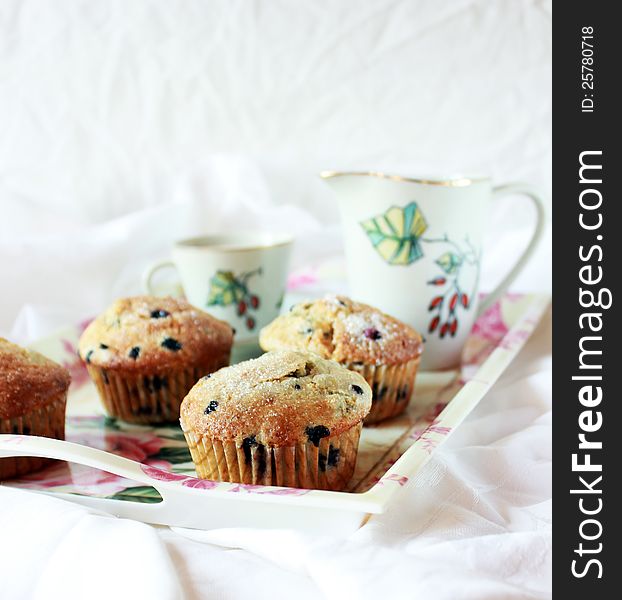 Breakfast in bed picture withe muffins and cup of coffee and milk. Breakfast in bed picture withe muffins and cup of coffee and milk