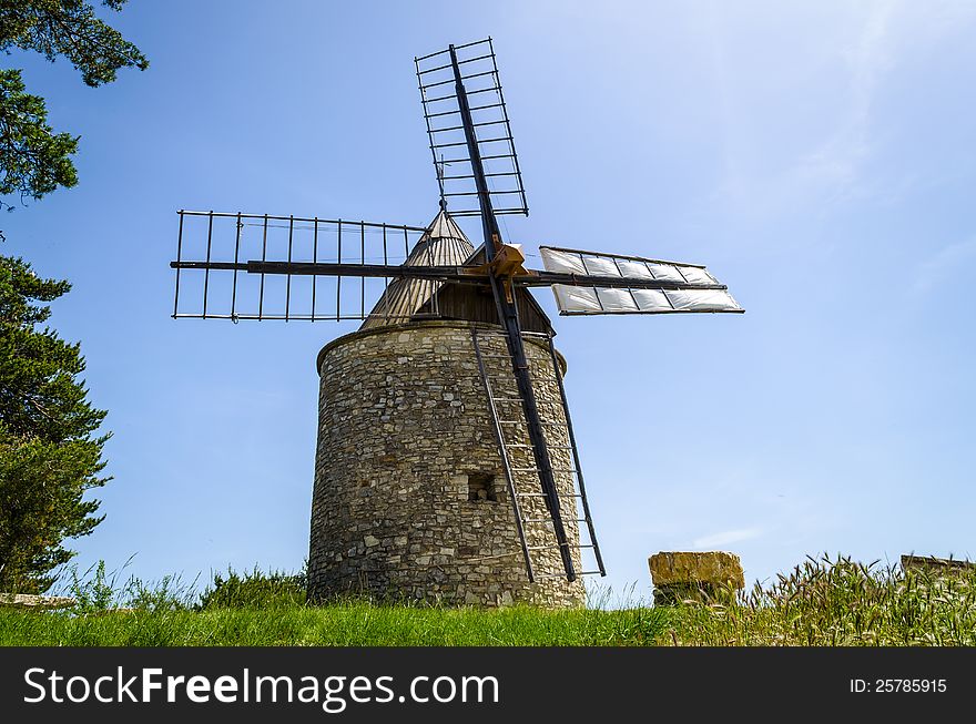 The historic windmill in the Provence village of Montfuron, France. The historic windmill in the Provence village of Montfuron, France.