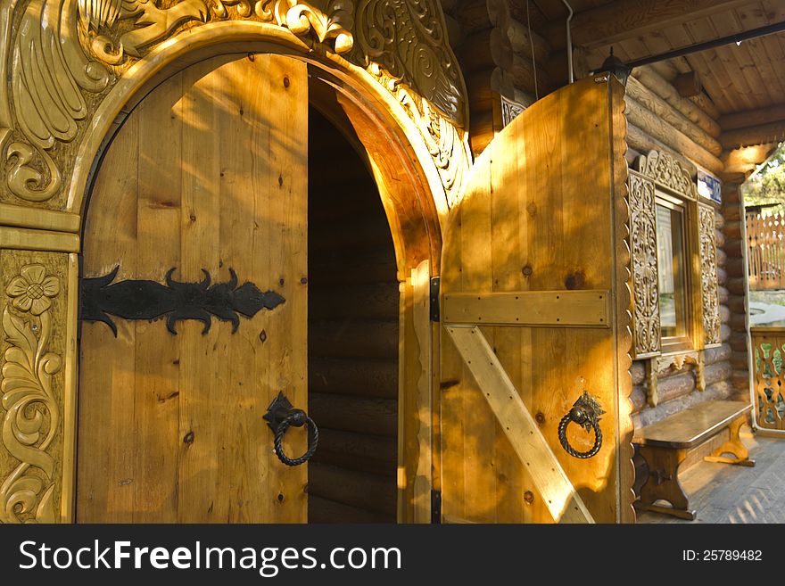 Wooden open door in Russian log hut. Wooden open door in Russian log hut