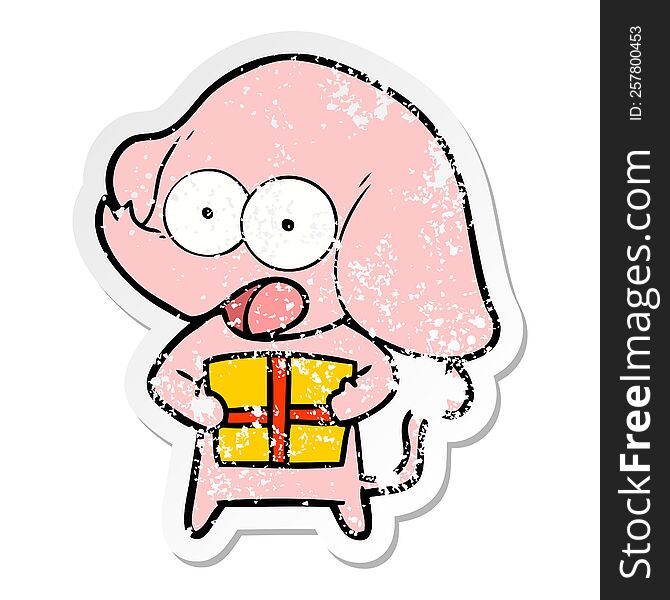 Distressed Sticker Of A Cute Cartoon Elephant With Christmas Present