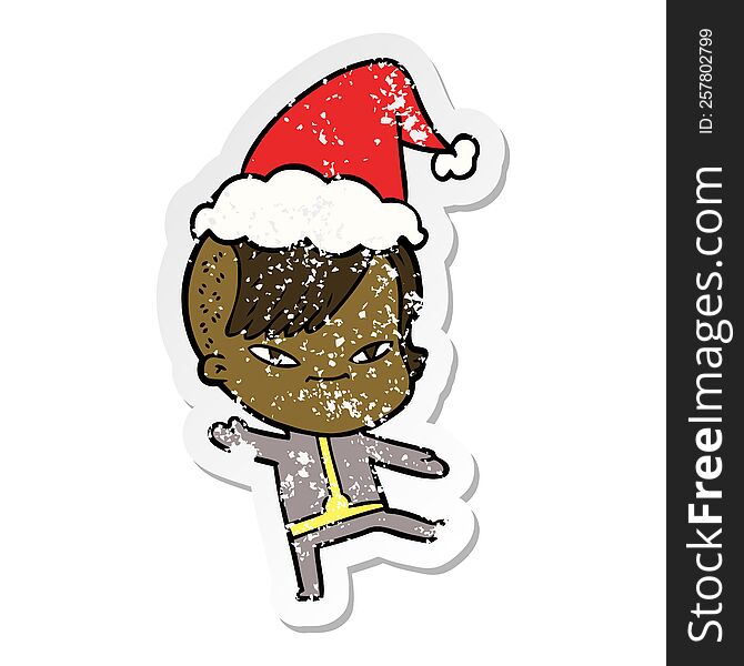 cute distressed sticker cartoon of a girl with hipster haircut wearing santa hat