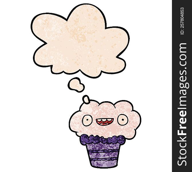 cartoon cupcake with thought bubble in grunge texture style. cartoon cupcake with thought bubble in grunge texture style