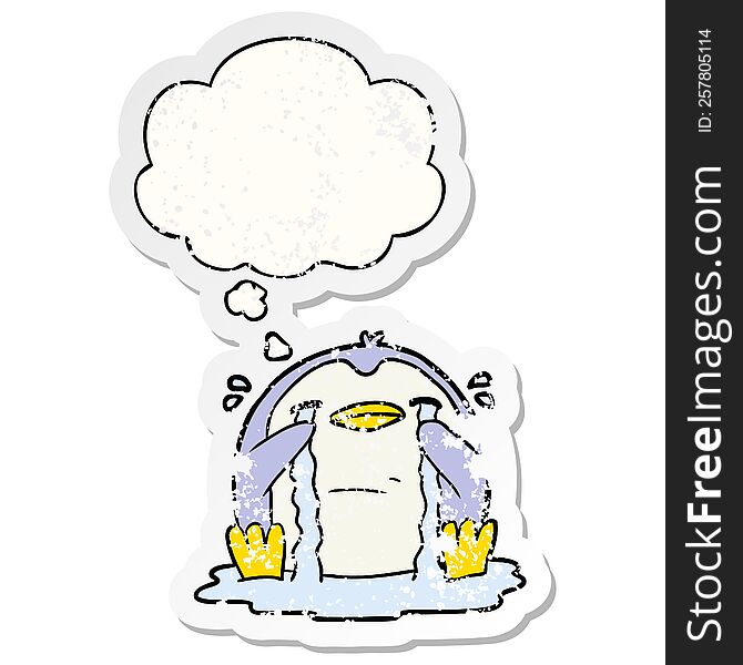 Cartoon Crying Penguin And Thought Bubble As A Distressed Worn Sticker