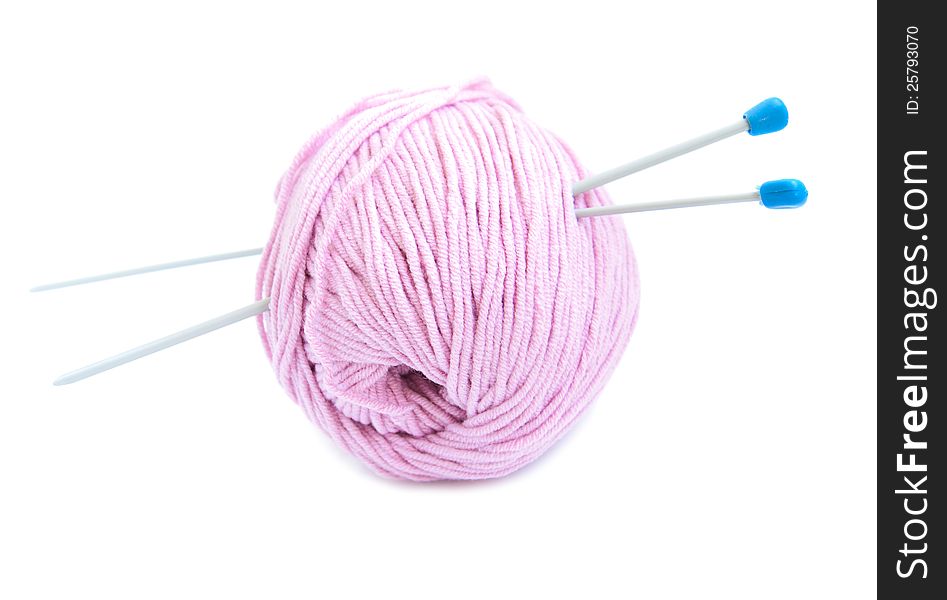 Yarn ball with needles on a white background. Yarn ball with needles on a white background