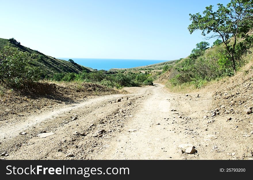 Dirt road leading to the sea. Dirt road leading to the sea
