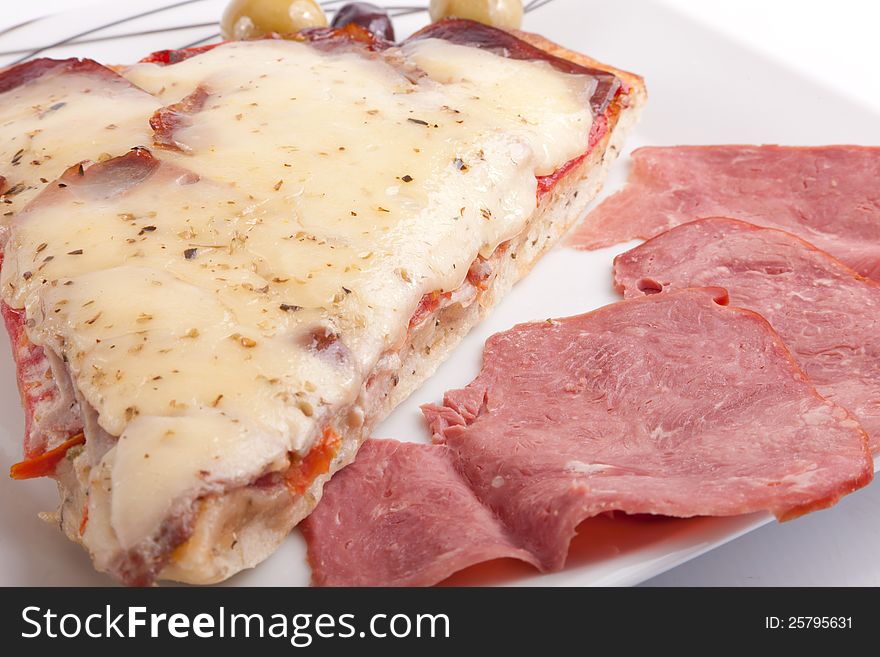 Pizza slice on a plate Closeup