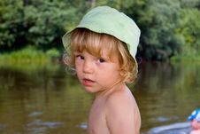 Little Kid Stands Near River Royalty Free Stock Images Little Kid Stands Near River Royalty Free Stock Images