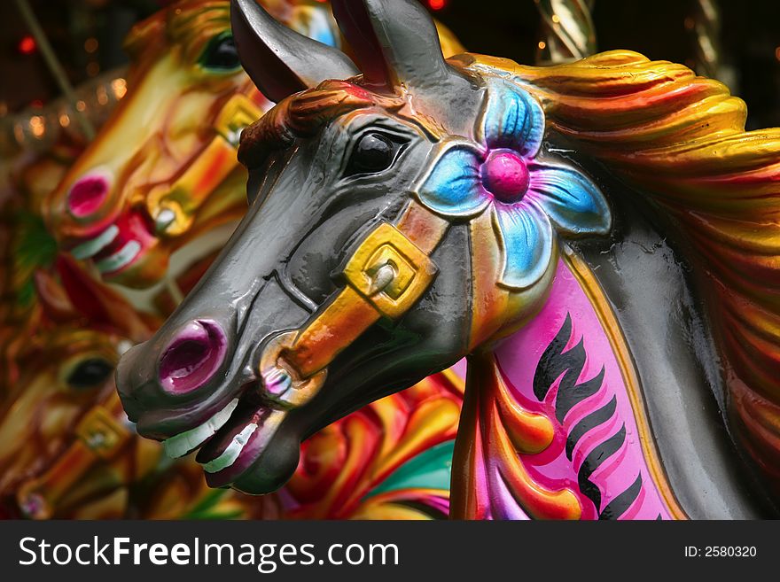 Vintage carousel horses brightly painted