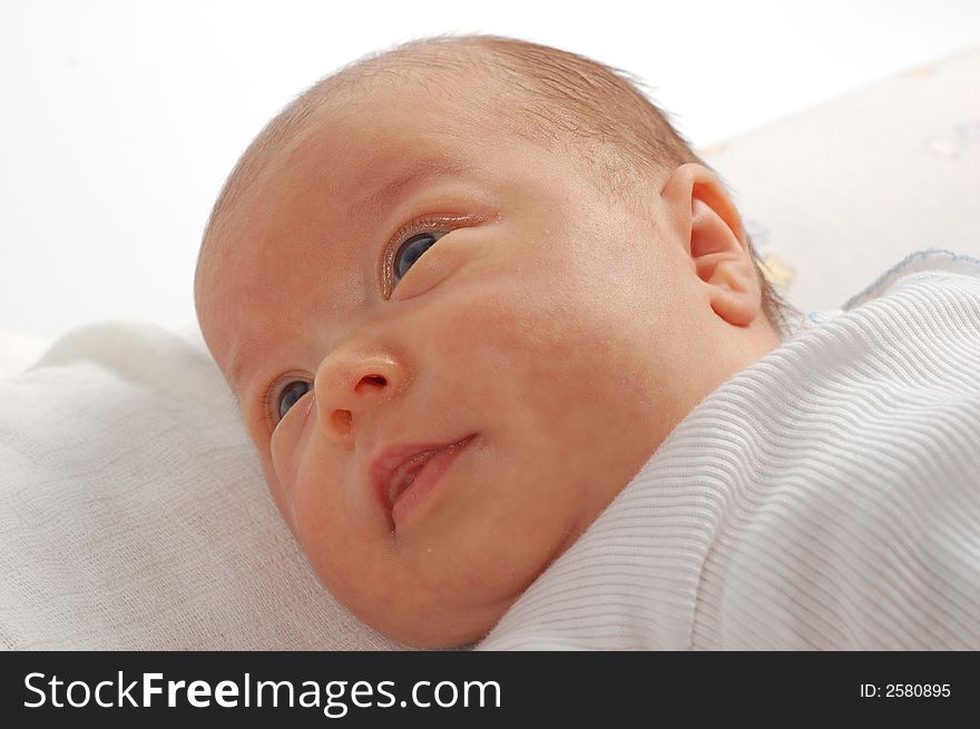 Photo of lying white newborn baby. Photo of lying white newborn baby