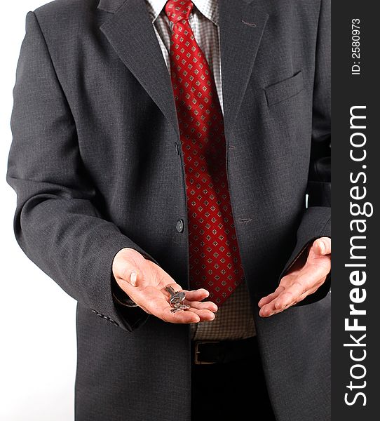 Businessman holding keys onwhite background. Businessman holding keys onwhite background