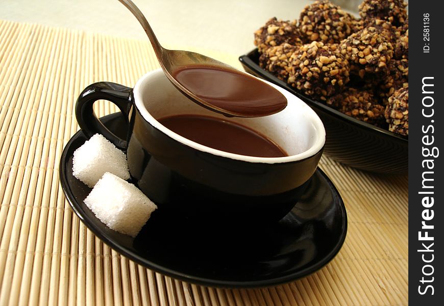 Cup of chocolate with fresh-baked cookies