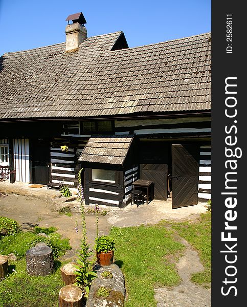 Wooden village house as an example of traditional czech architecture.