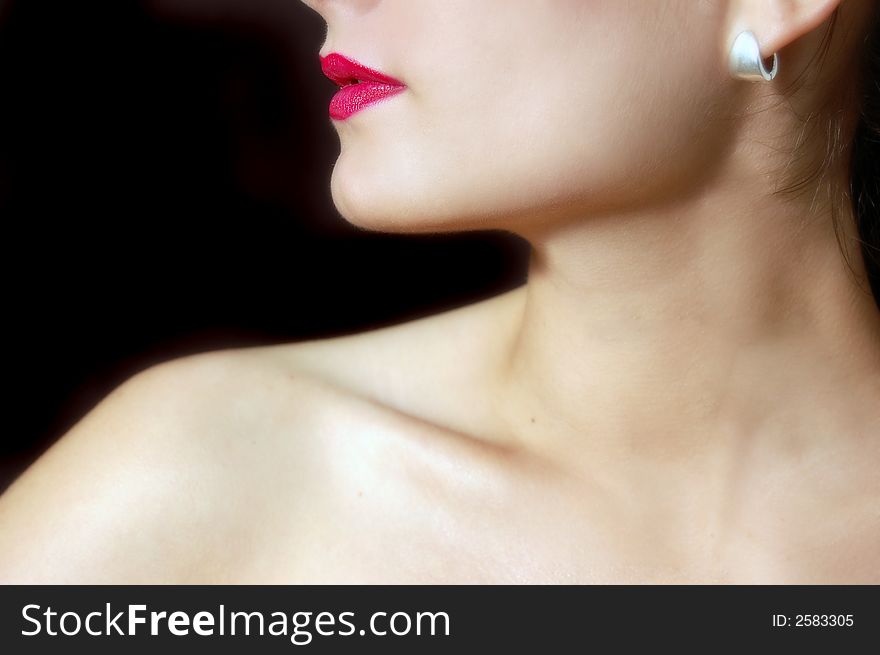 Girl with red lips and earings